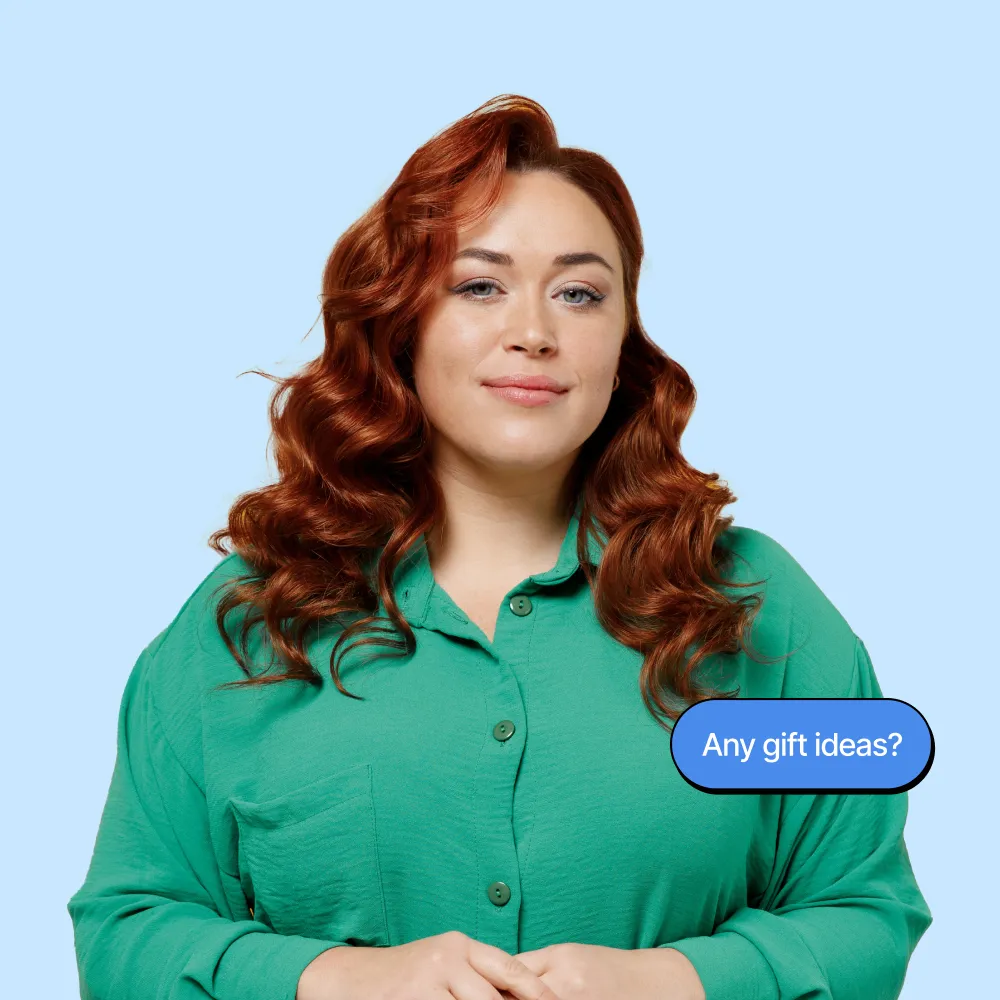 A woman in a green shirt is holding her arms crossed.