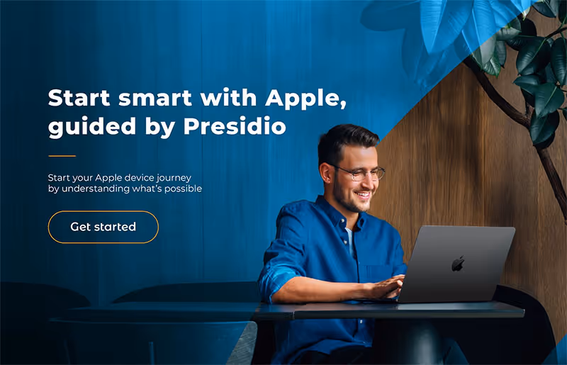 Brochure cover showing man on laptop