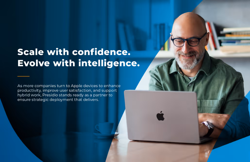 Brochure cover showing man on laptop