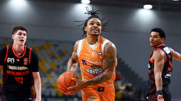 Wildcats take charge of Taipans after fire alarm