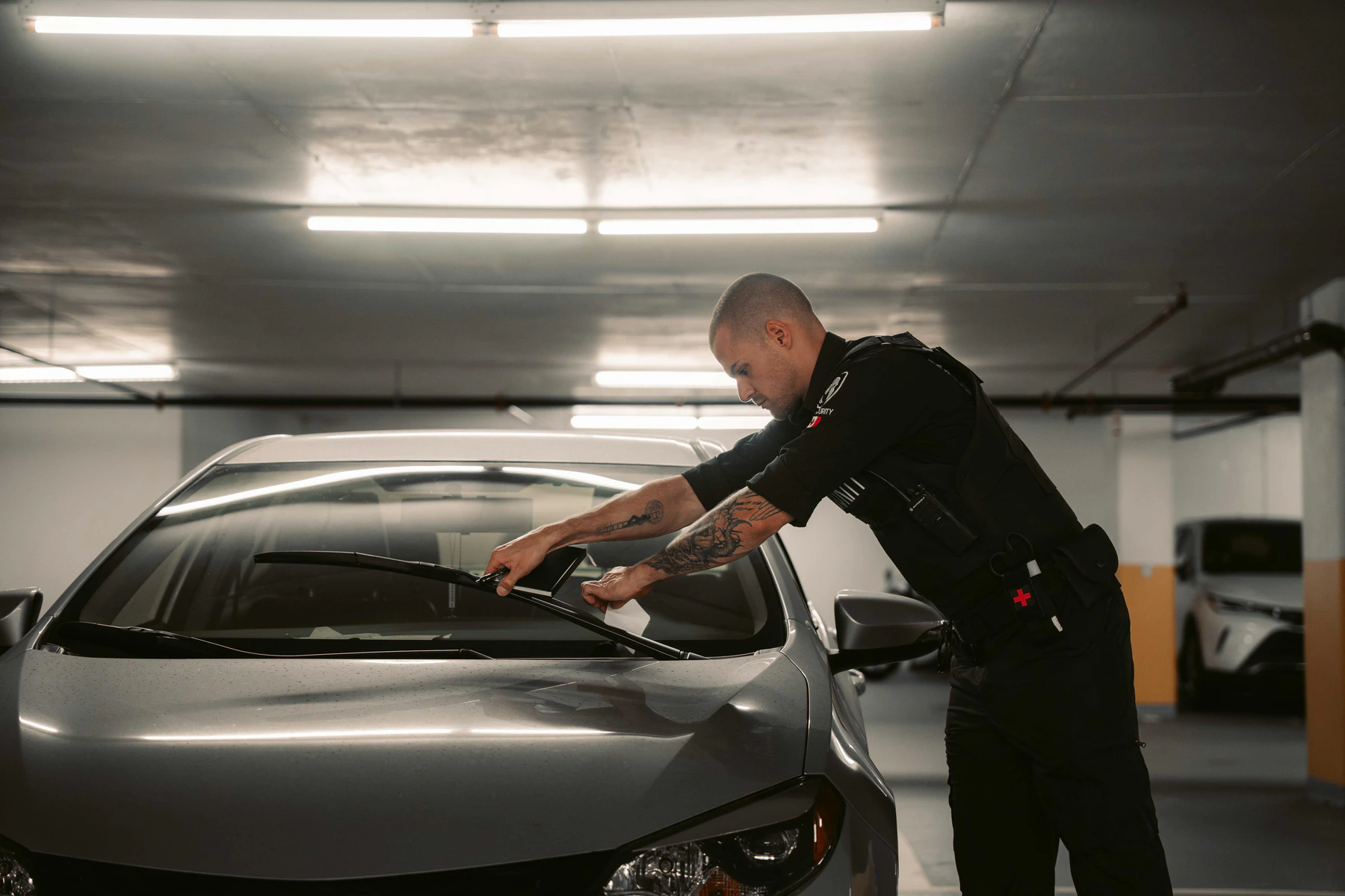 Security personnel supporting safety and access control for parking security