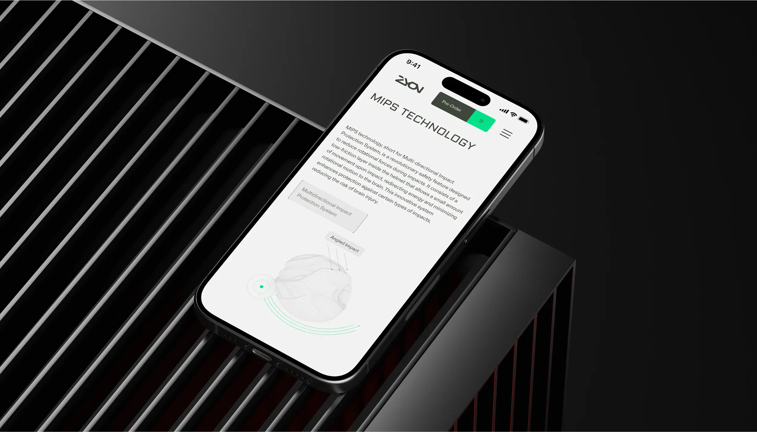 Smartphone displaying a webpage about MIPS TECHNOLOGY with detailed text and a graphic of a helmet's impact protection system, placed on a black slatted surface.