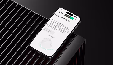 Smartphone displaying a webpage with text and geometric graphics on a black slatted surface.