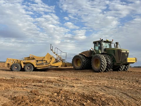 image of tractors in action for agricultural services