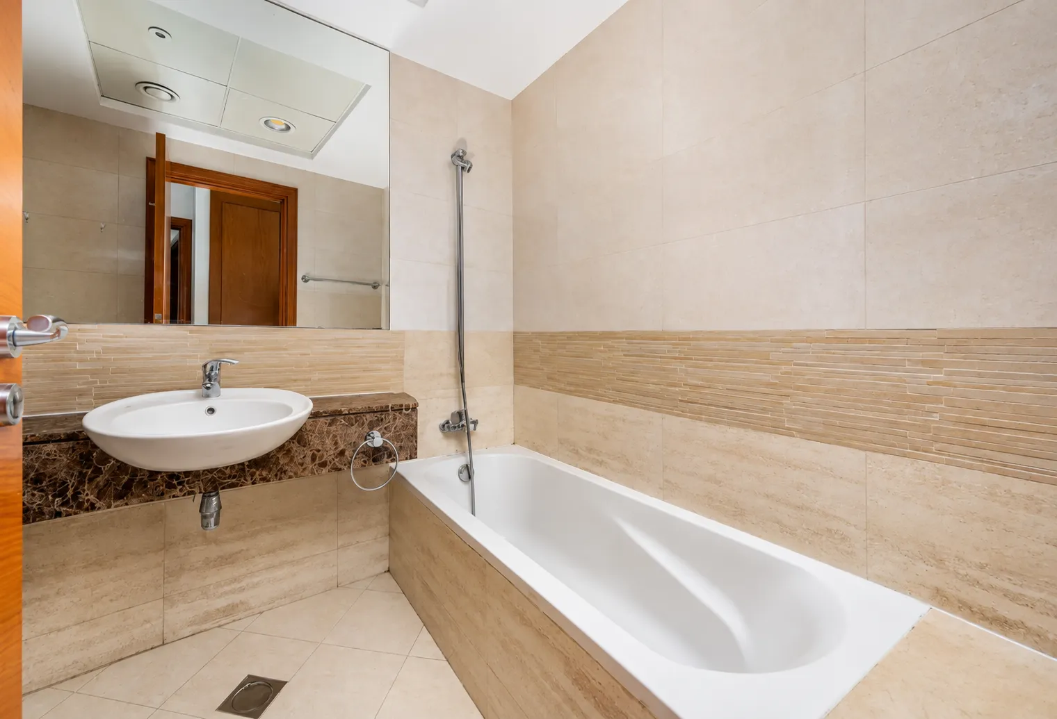 Bathroom before renovation in Dubai Marina