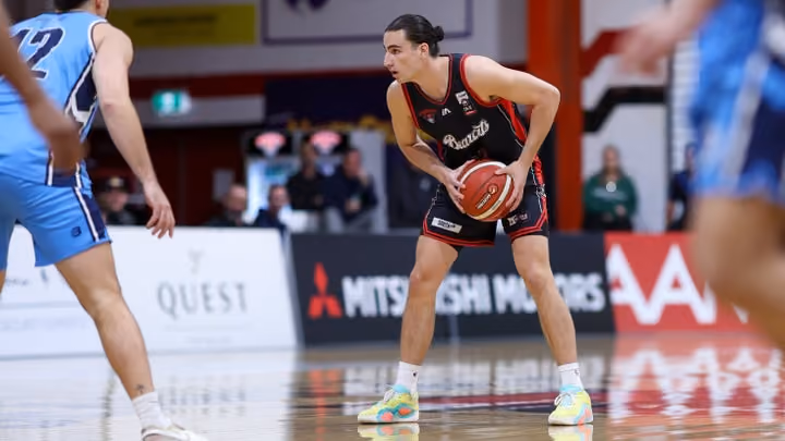Rasmussen wins Woollacott Medal