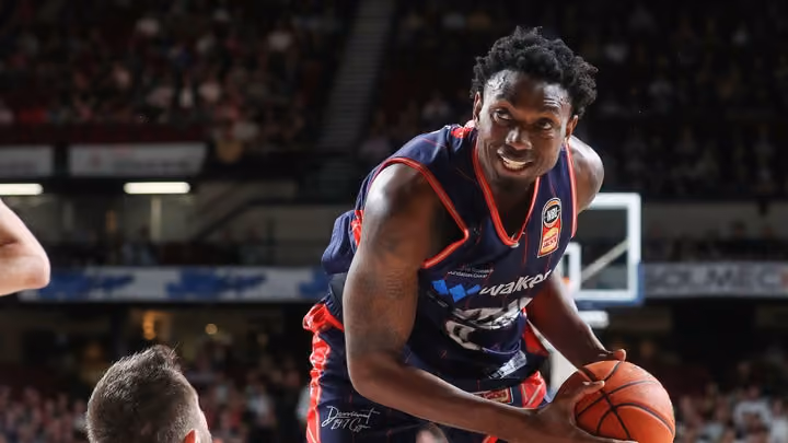 Cotton fires late to sink 36ers