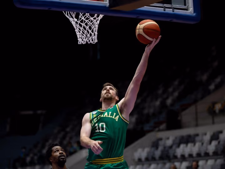 McCarron leads Boomers in opening win
