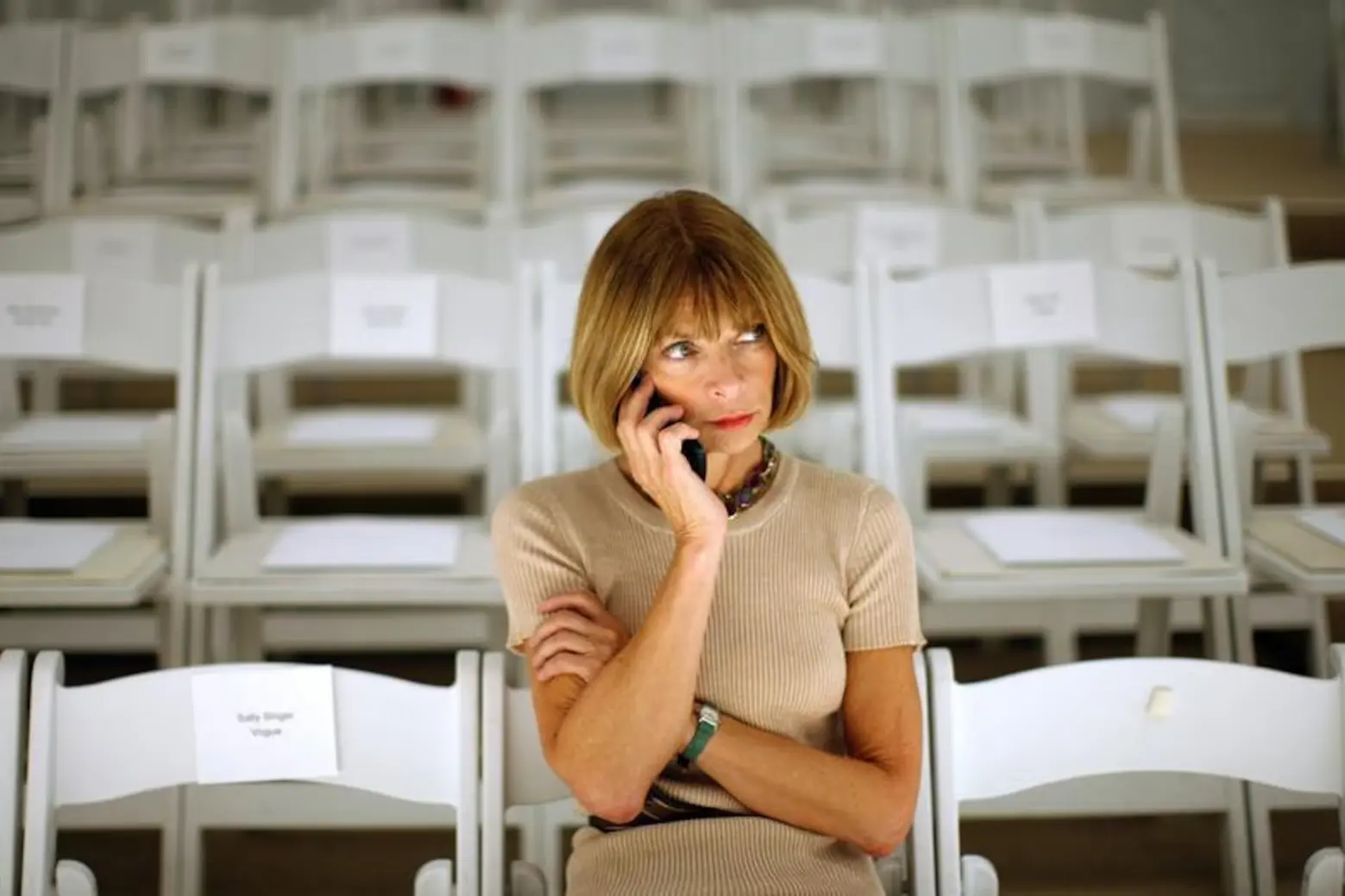 Vogue editor Anna Wintour spoke on a cell phone before the J. Mendel Spring 2008 collection during New York Fashion Week September 7, 2007 Vogue editor Anna Wintour spoke on a cell phone before the J. Mendel Spring 2008 collection during New York Fashion Week September 7, 2007