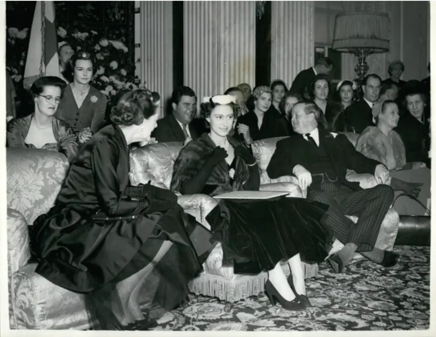 Princess Margaret (middle) seated beside the Duchess of Marlborough, watching a show of Christian Dior Autumn/Winter collection fashion show at Blenheim Palace in Woodstock in England in the United Kingdom, on November 4, 1954 Princess Margaret (middle) seated beside the Duchess of Marlborough, watching a show of Christian Dior Autumn/Winter collection fashion show at Blenheim Palace in Woodstock in England in the United Kingdom, on November 4, 1954