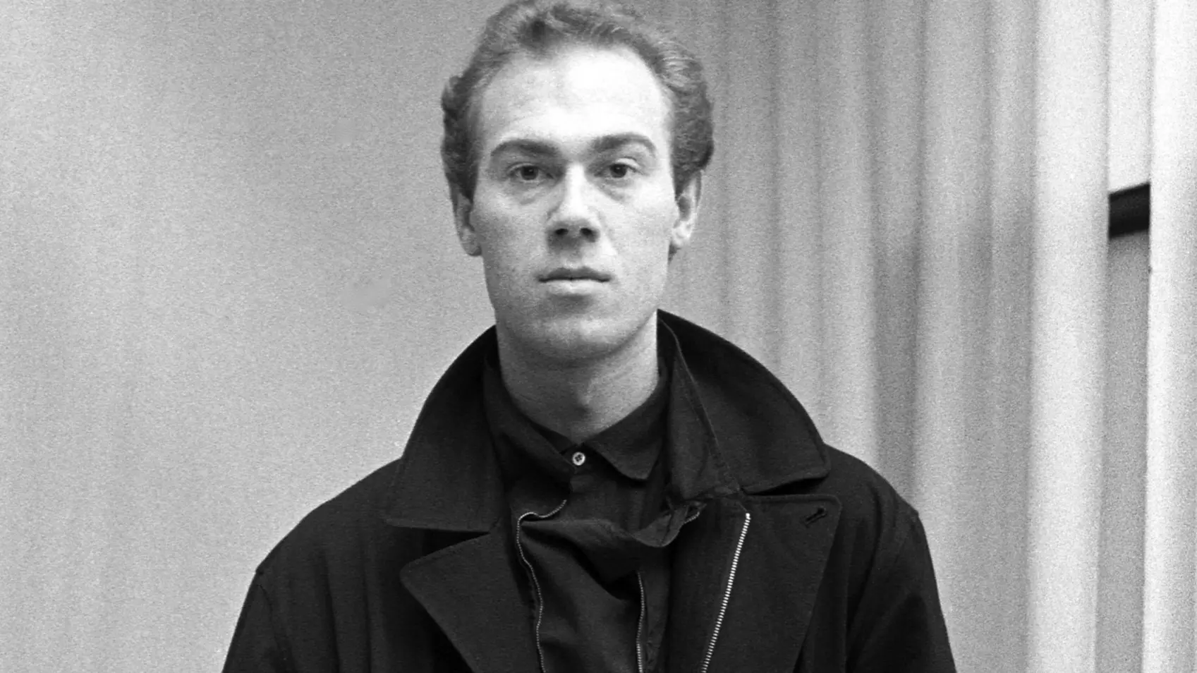 Martin Margiela, Belgian designer and founder of Maison Margiela (est. 1988), famed for deconstruction, anonymity, and avant-garde subversion.