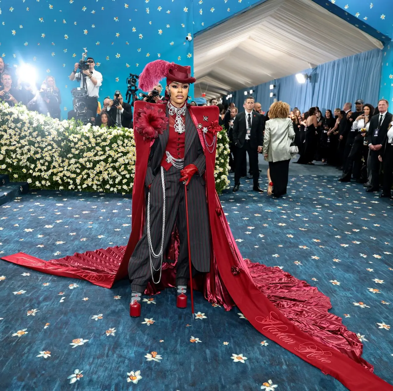 Teyana Taylor wore a tailor-made red three-piece pinstripe suit with an extravagant red padded cape over it to the 2025 Met Gala Teyana Taylor wore a tailor-made red three-piece pinstripe suit with an extravagant red padded cape over it to the 2025 Met Gala