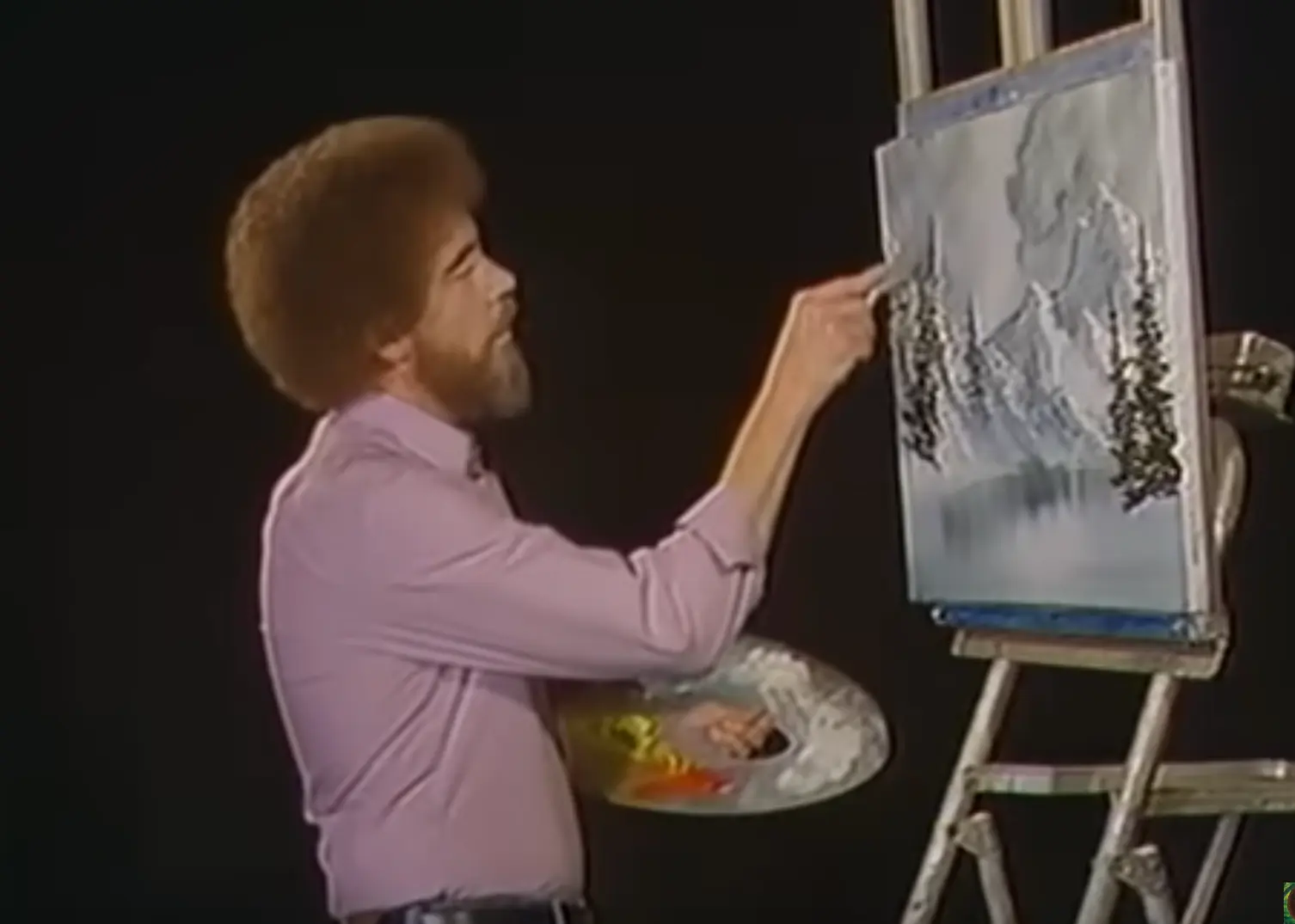 Bob Ross working on the grayscale painting Bob Ross working on the grayscale painting