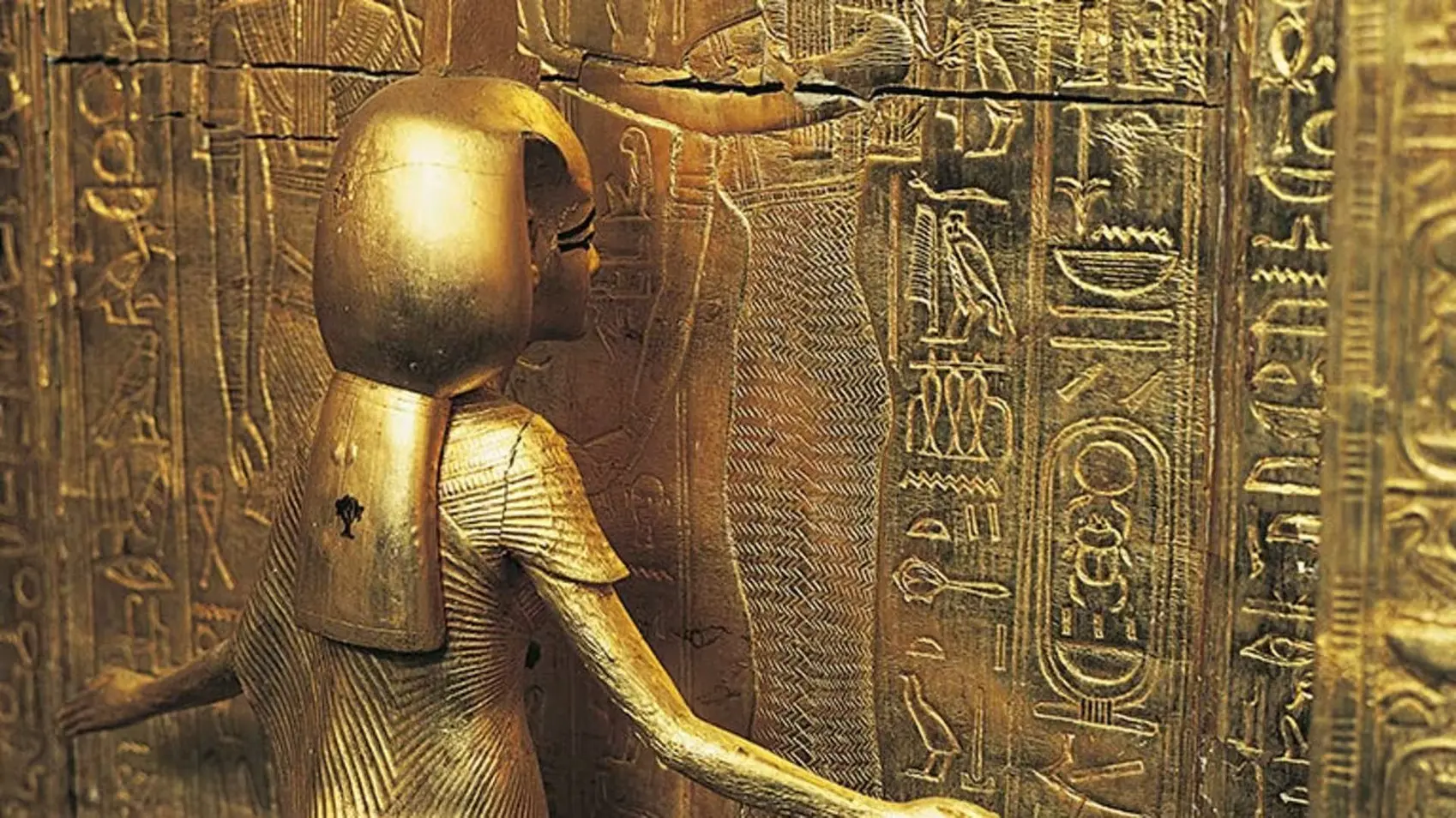 The goddess Selket in th gilded shrine of canopic jars or canopic chest from King Tut’s tomb The goddess Selket in th gilded shrine of canopic jars or canopic chest from King Tut’s tomb