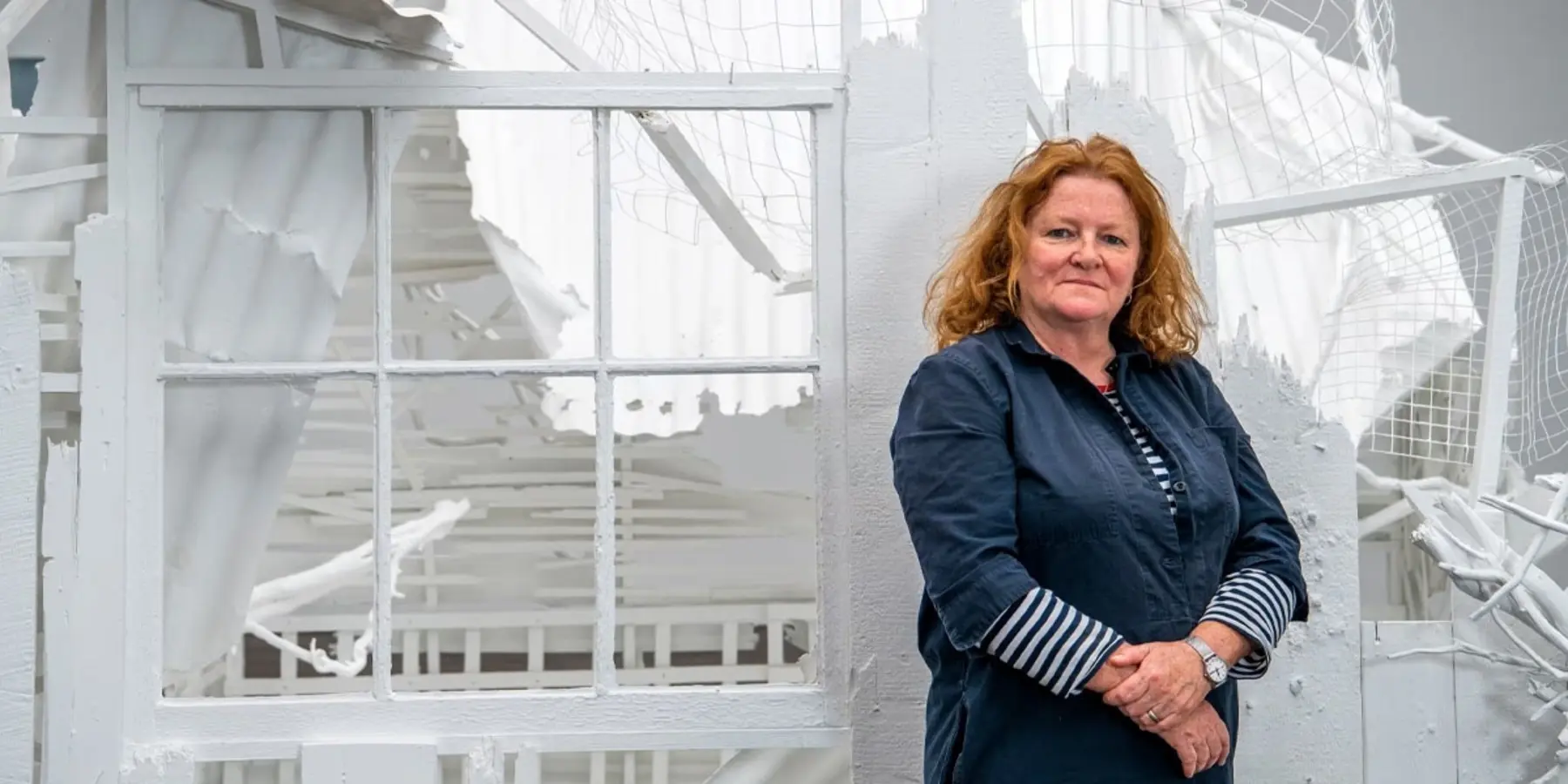 Rachel Whiteread sitting on the front steps of "House", her controversial 1993 creation Rachel Whiteread House sculpture3