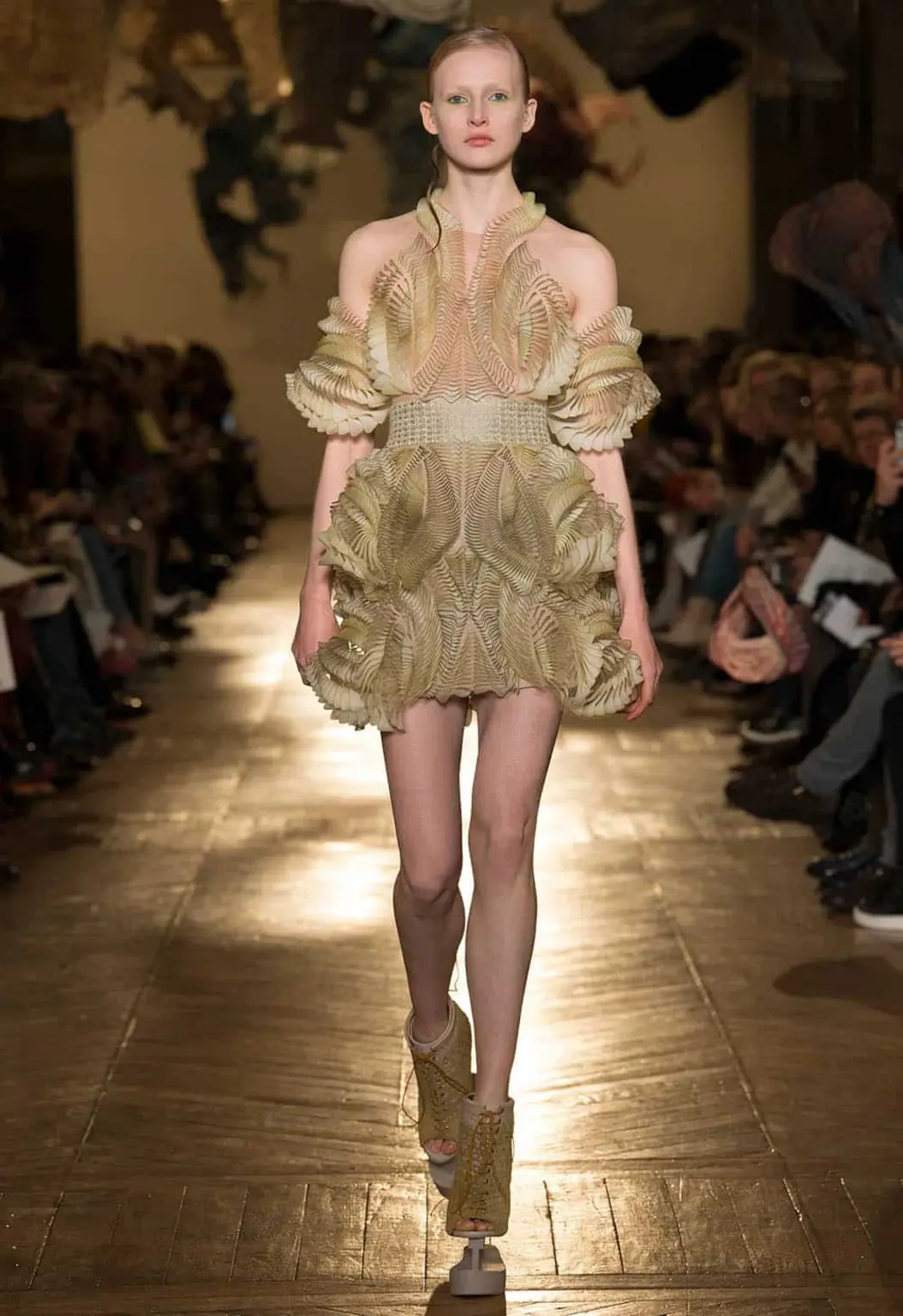 This refers to the initial outfit, Look 1, showcased in Iris van Herpen's Spring 2018 Haute Couture collection