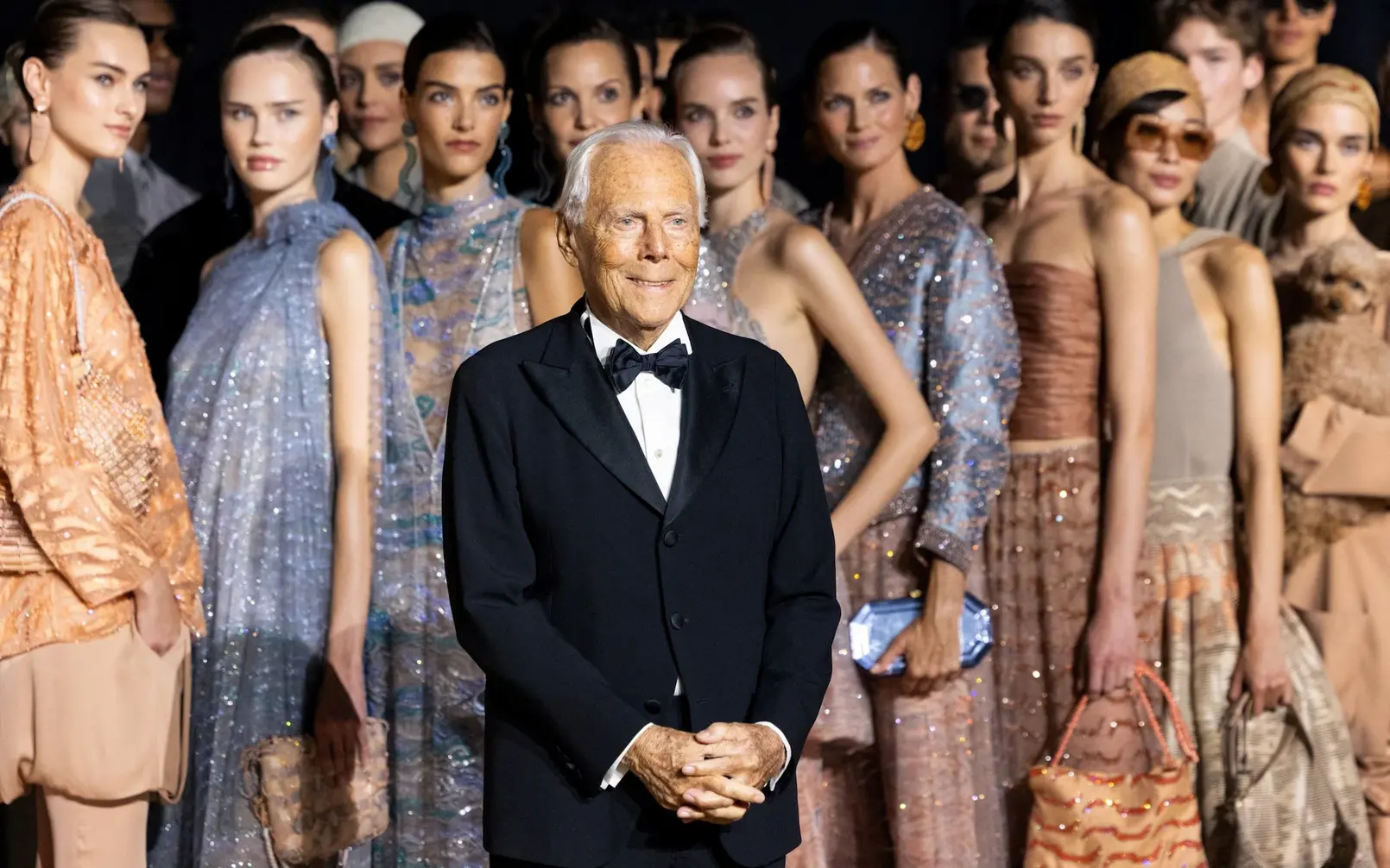 Giorgio Armani with models before presenting the Spring Summer 2025 collection in New York