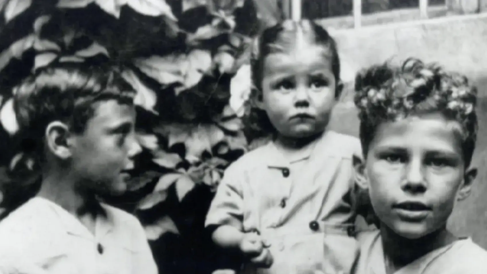 Armani (on the left) with his childhood friends in Italy during World War Two