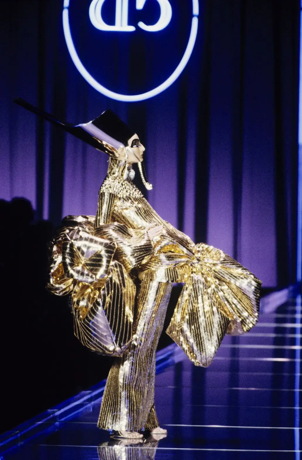 Nefertiti-inspired headdress on the runway of the Christian Dior Spring 2004 couture collection in Paris