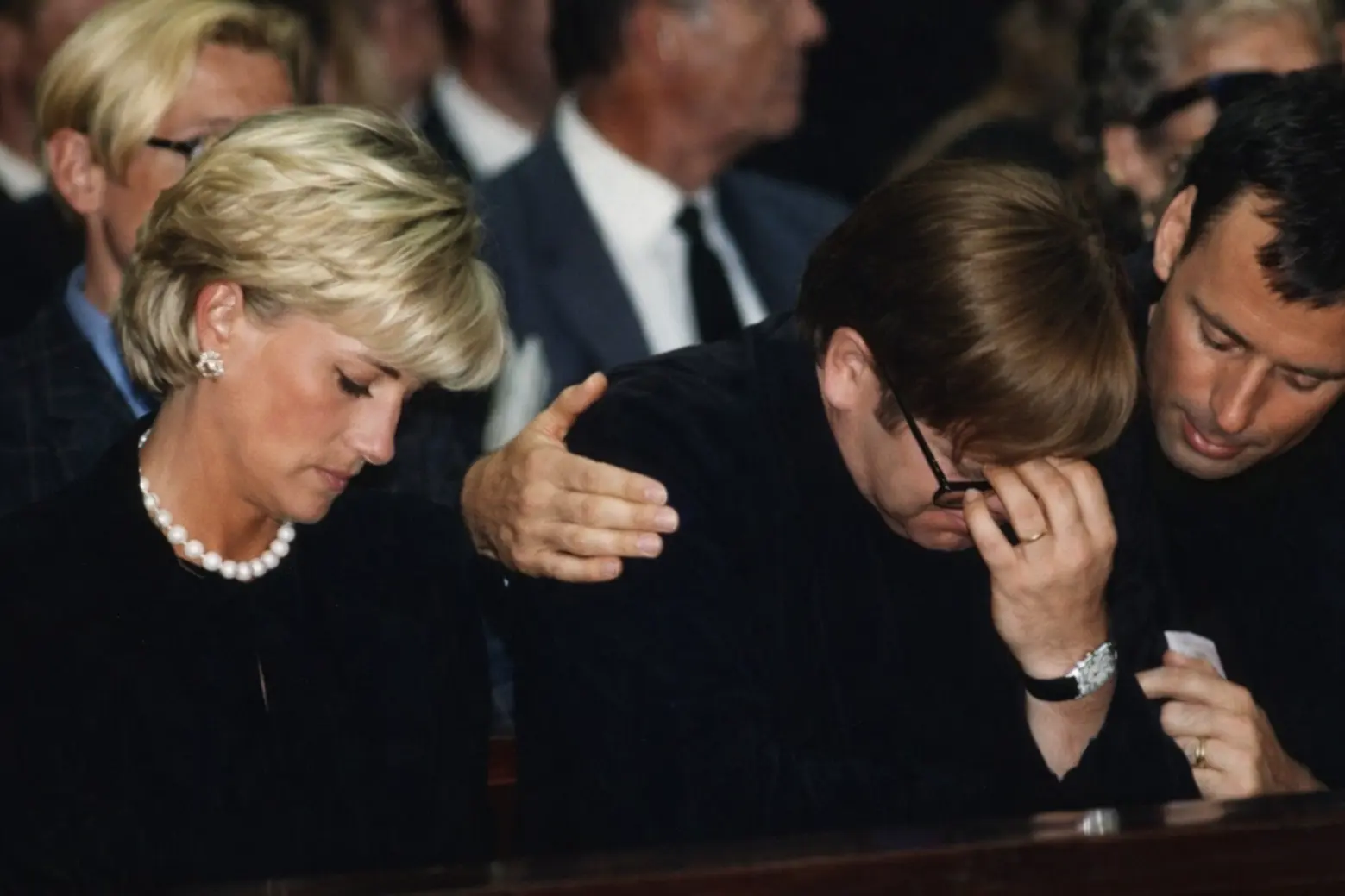 Princess Diana and Elton John at Gianni Versace's Funeral Princess Diana and Elton John attending Gianni Versace’s funeral after the Gianni Versace death in 1997
