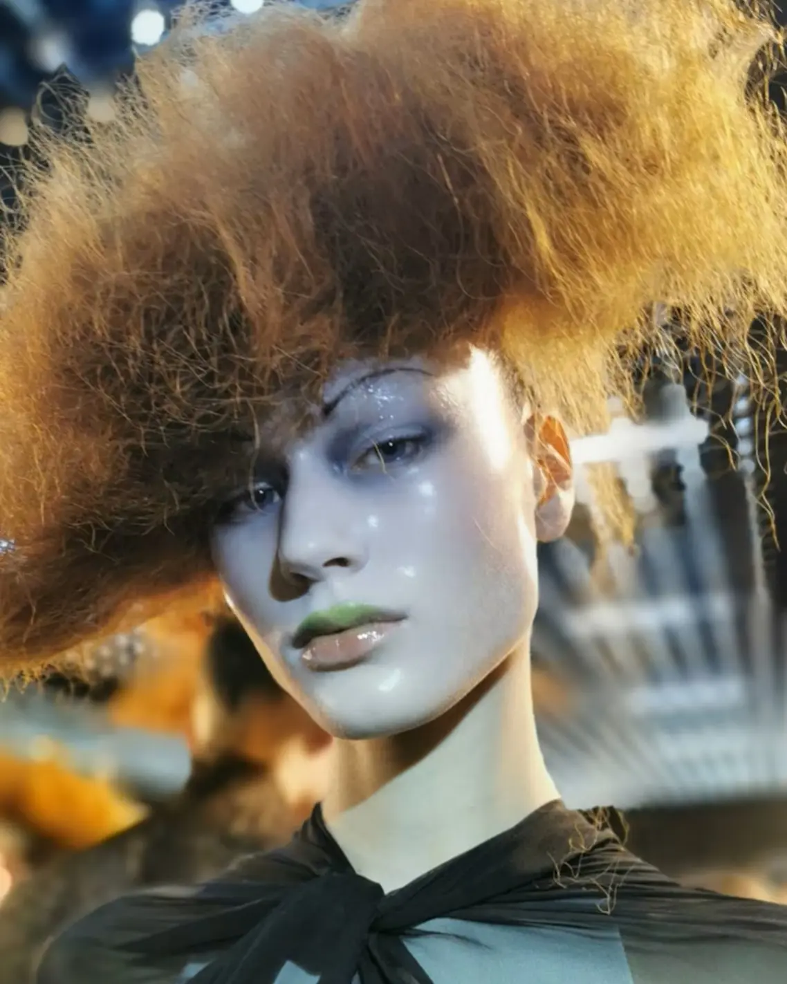 A model with "glass skin" look for Margiela couture A model with "glass skin" look for Margiela couture