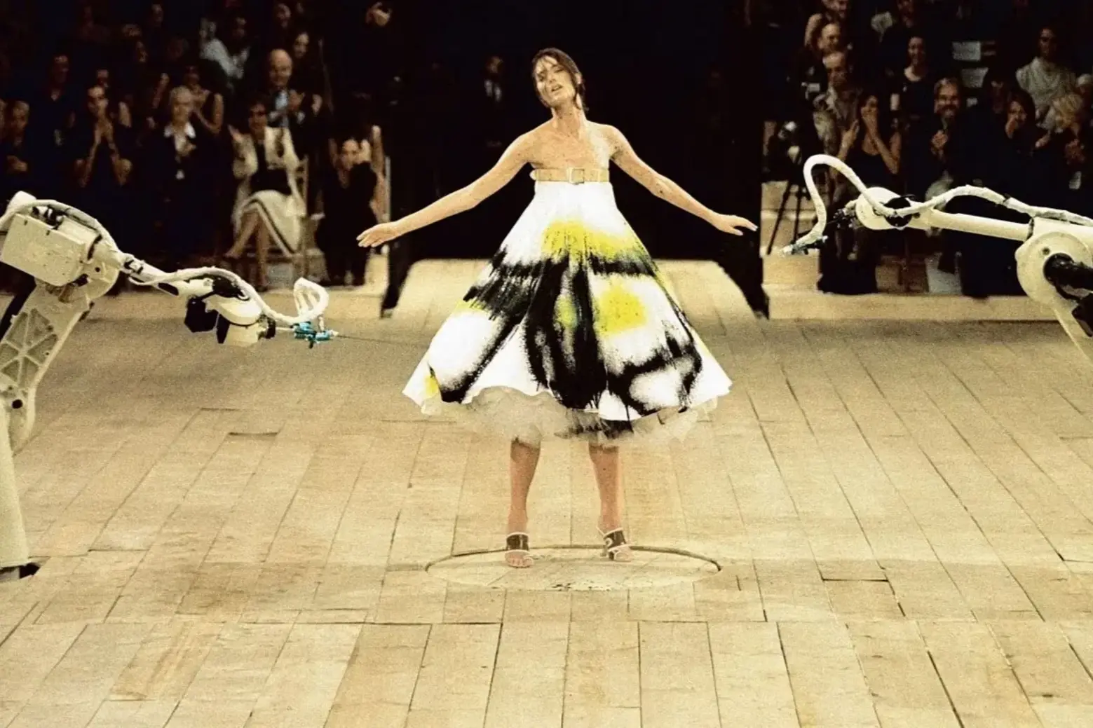 Shalom Harlow in the finale of Alexander McQueen Spring 1999 fashion exhibition Shalom Harlow in the finale of Alexander McQueen Spring 1999