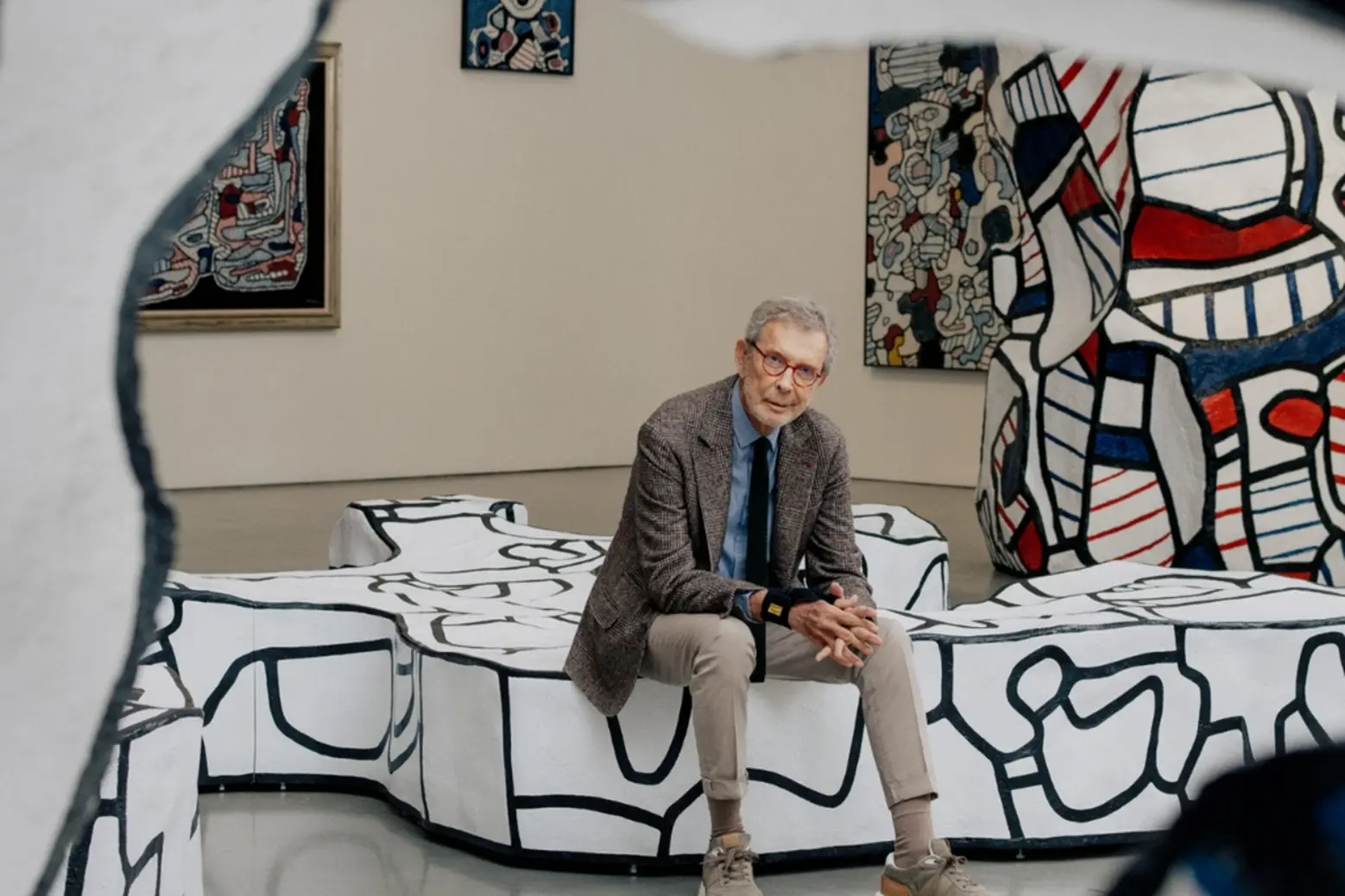 Arne Glimcher sitting in Pace Gallery among Jean Dubuffet's arrworks art galleries to see in New York Arne Glimcher sitting in Pace Gallery among Jean Dubuffet's arrworks