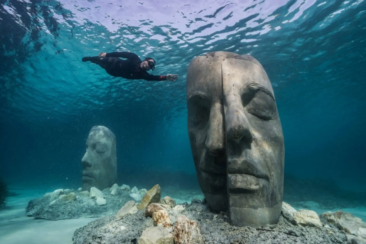 Monumental stone faces by Jason deCaires Taylor luxury travel destinations Cannes