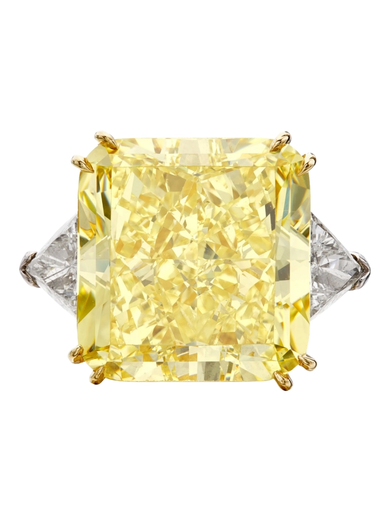 Fancy Intense Yellow Diamond and Diamond Ring, 34.75 carats, sold for 1,024,000 USD colorful gems