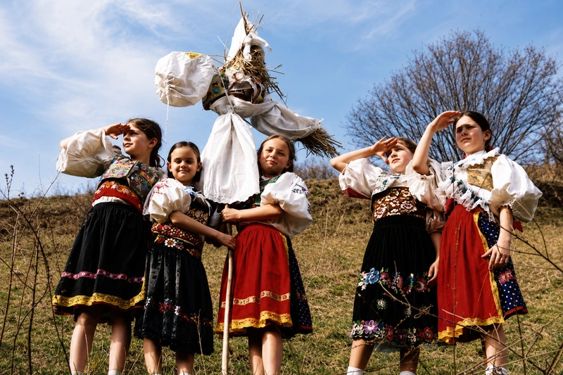 Slovak folk ritual Vynášanie Moreny with young girls in traditional kroje European Folklore Style: Tales Woven Into the Soul 0