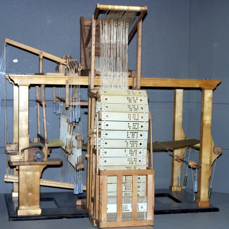 Joseph Marie Jacquard’s 1801 mechanized jacquard loom Brocade Fabric: A Regal Tapestry of Power and Tradition 14