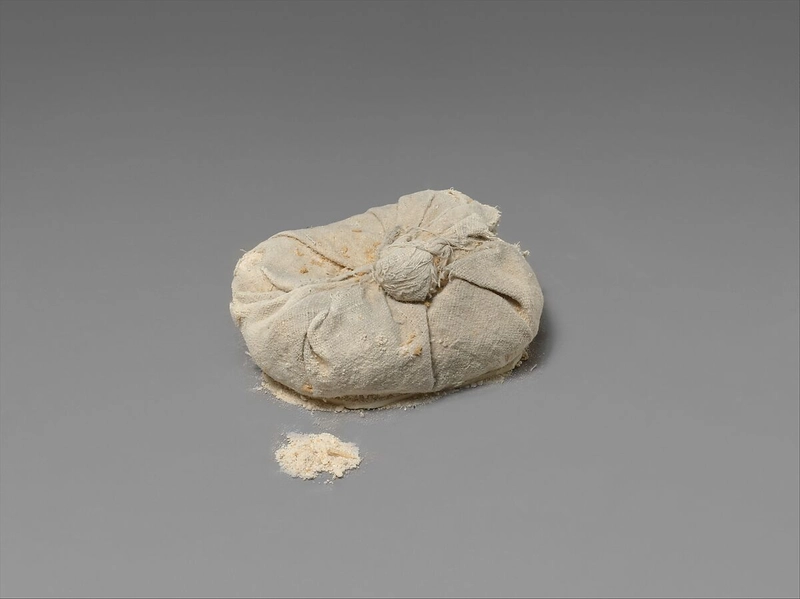 Linen bag filled with natron salt from the embalming cache of King Tutankhamun, created around 1336–1327 BCE From Prehistoric Flax to Modern Linen Fabric 1