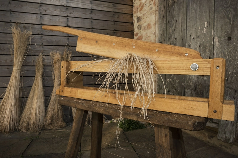 Wooden flax break, an antique tool used in the manual processing of flax plants to break up the woody inner stalks before spinning them into linen How Is Linen Fabric Made? 2