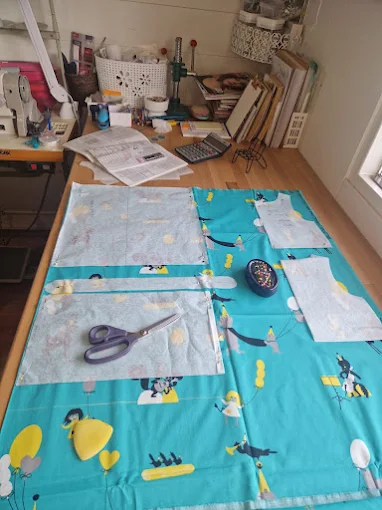 image of a tailor sketching designs