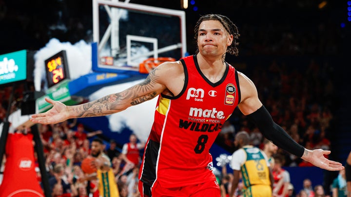 Usher's record debut as Wildcats beat Tassie