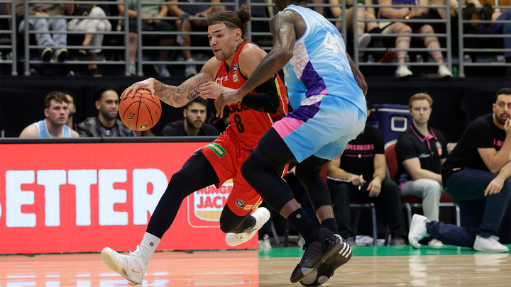 Usher the hero as Cats complete unbeaten Blitz