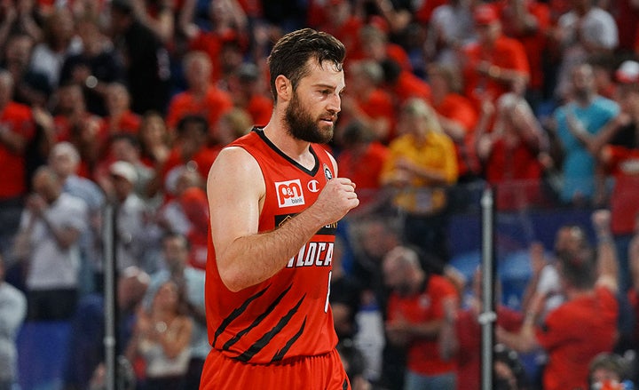 Mitch Norton re-signs