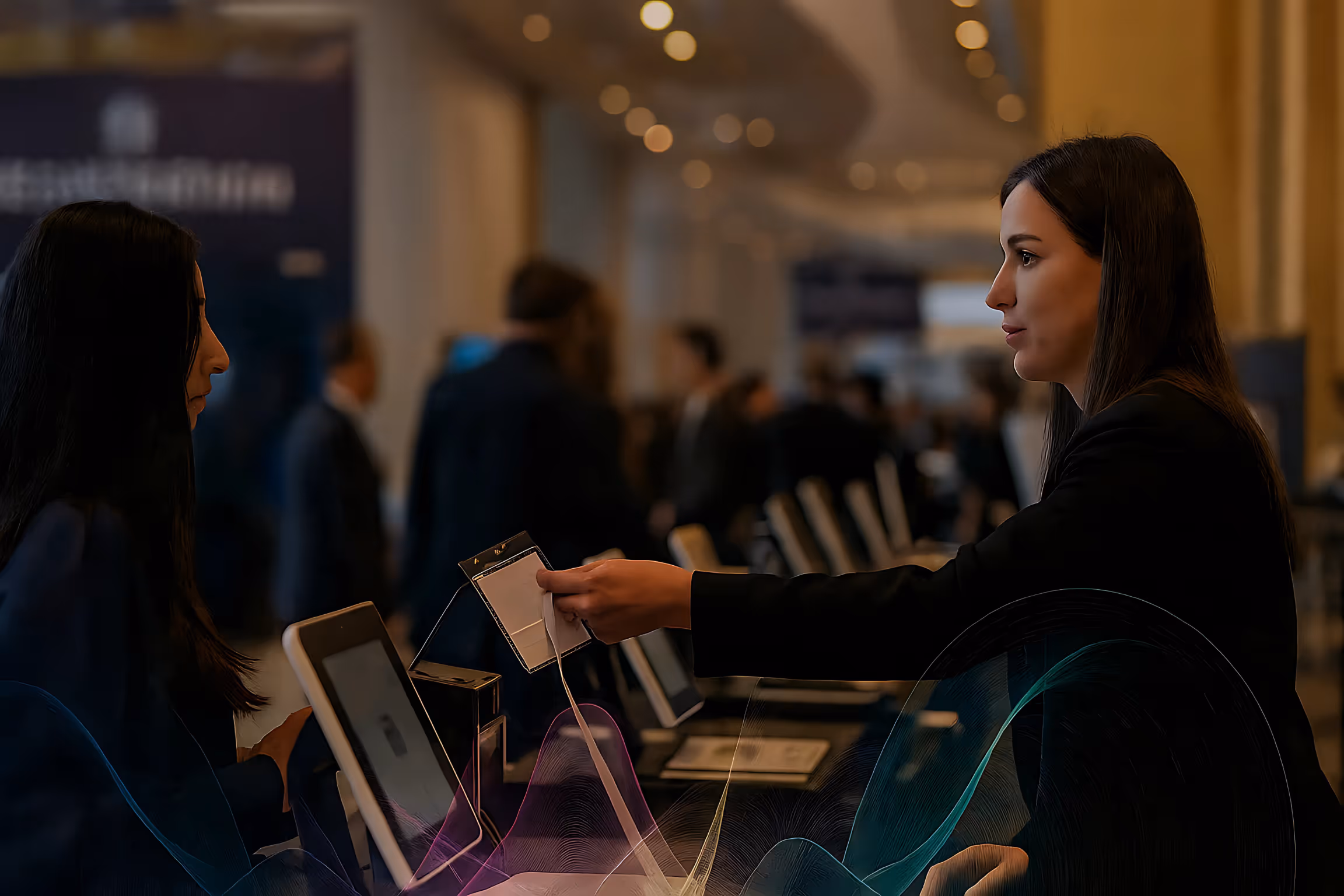Professional event staff member using tablet for attendee registration