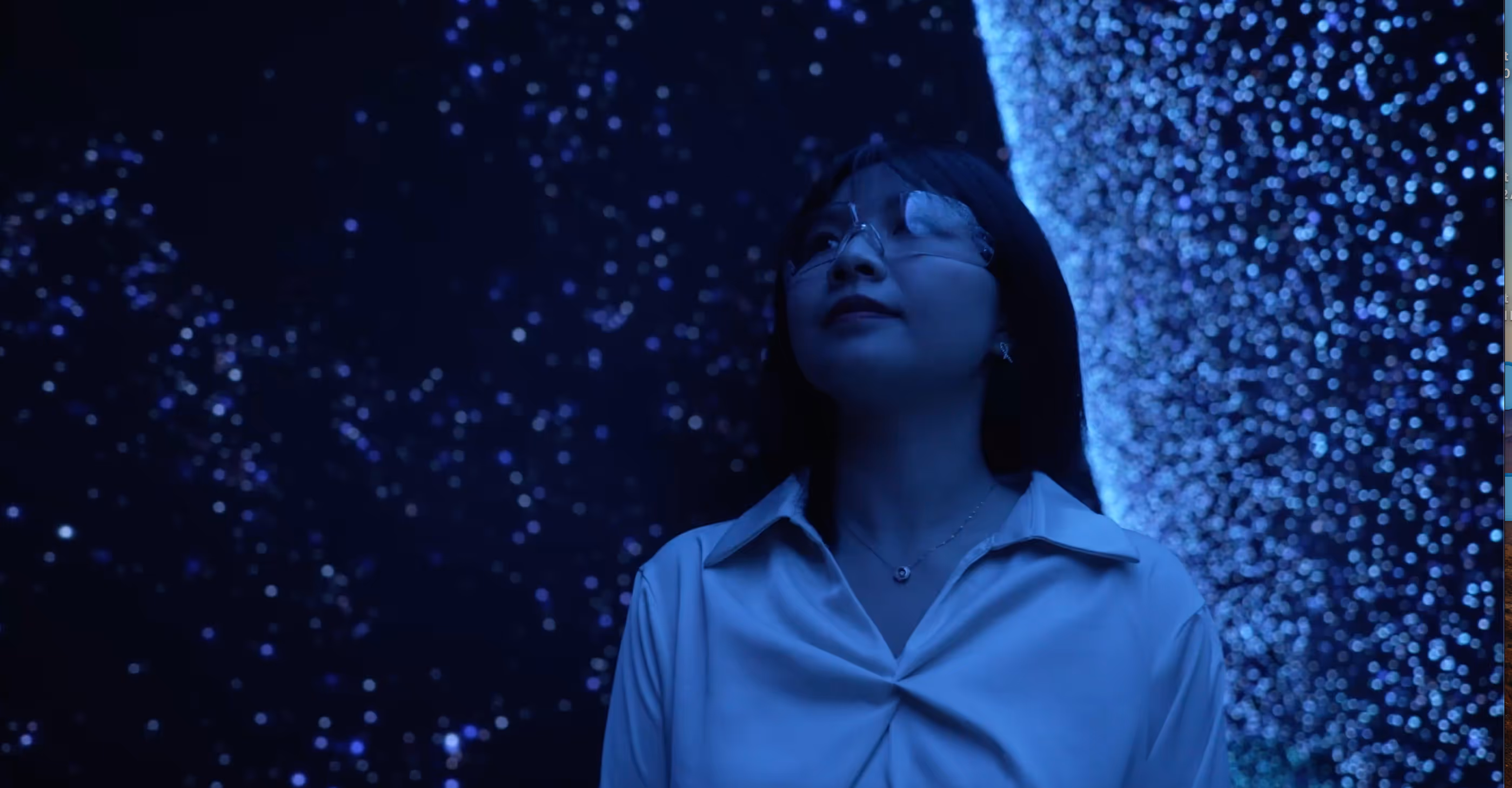 Young asian female student in a sci-fi space