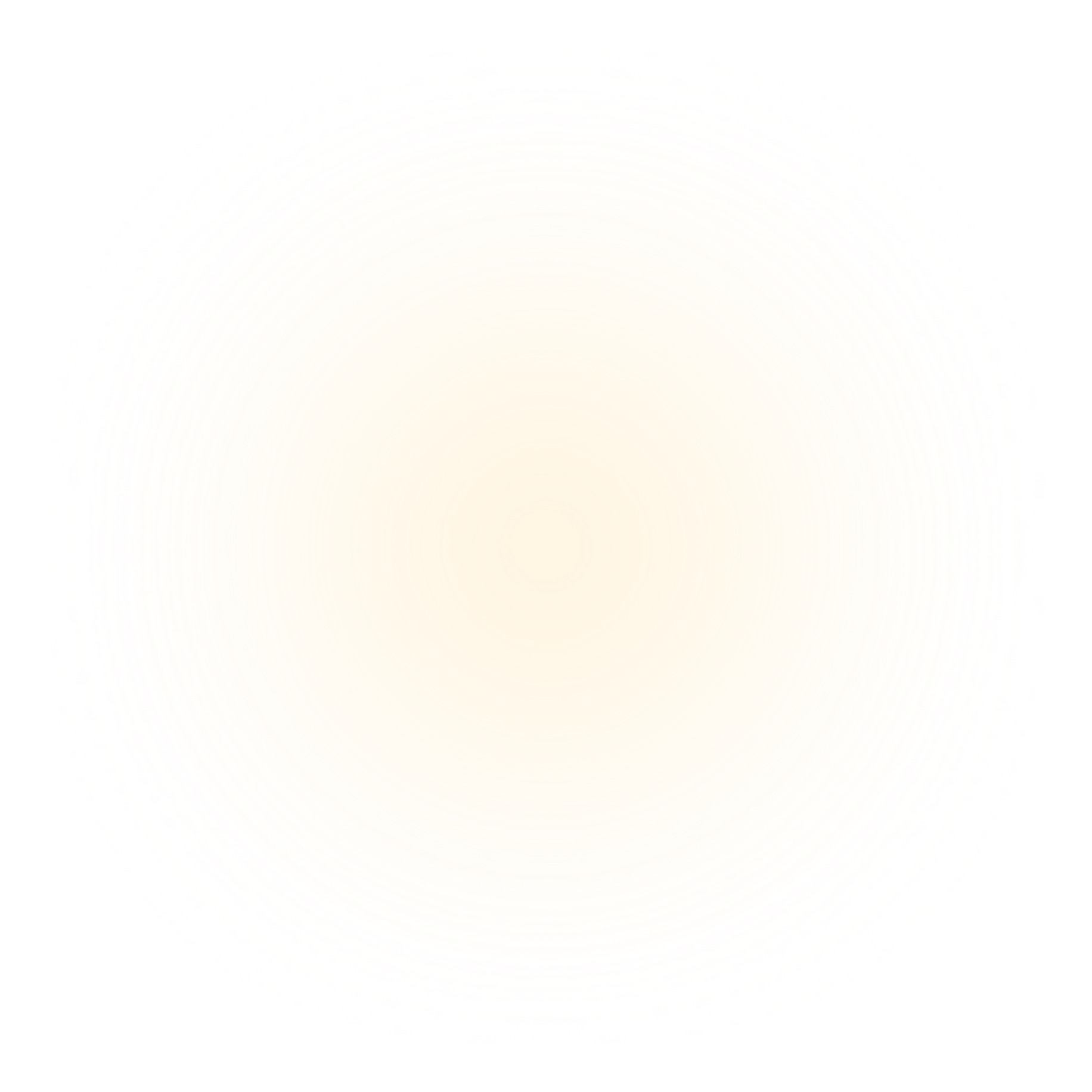 Soft, blurred circular glow with yellow and red hues on a black background.