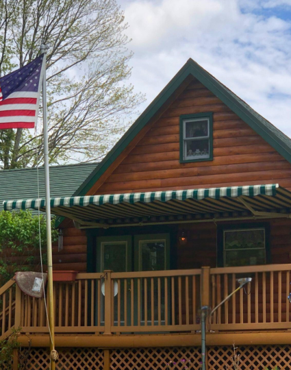 How Awnings and Shade Solutions Slash Cooling Costs