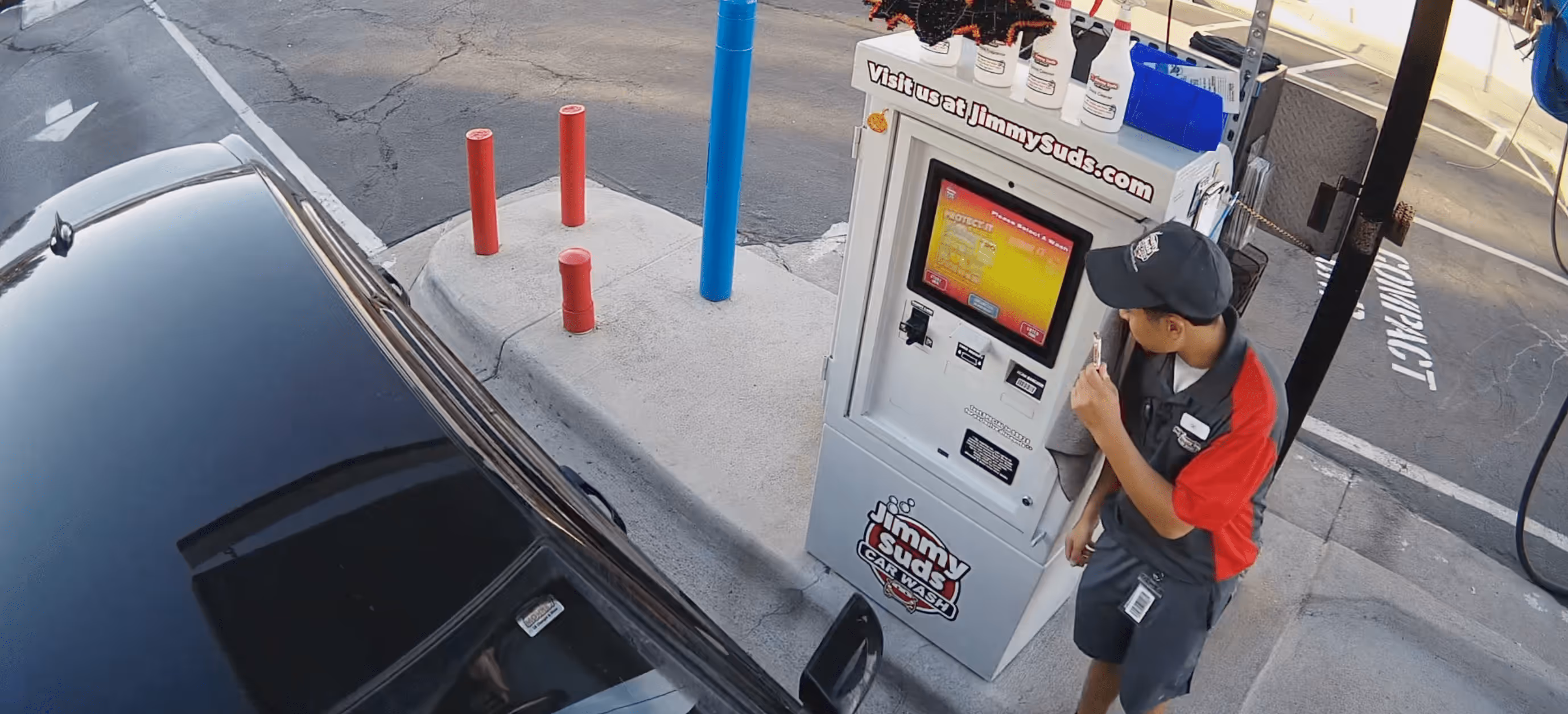 View of a sales interaction at a car wash paystation