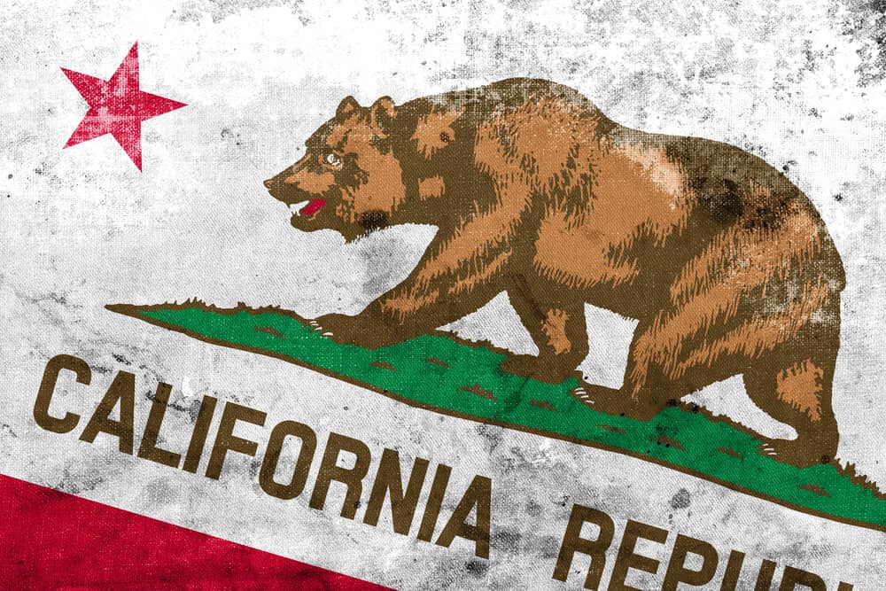 California state flag featuring a grizzly bear and red star, symbolizing strength and independence—used to represent California contractor and license bonds.