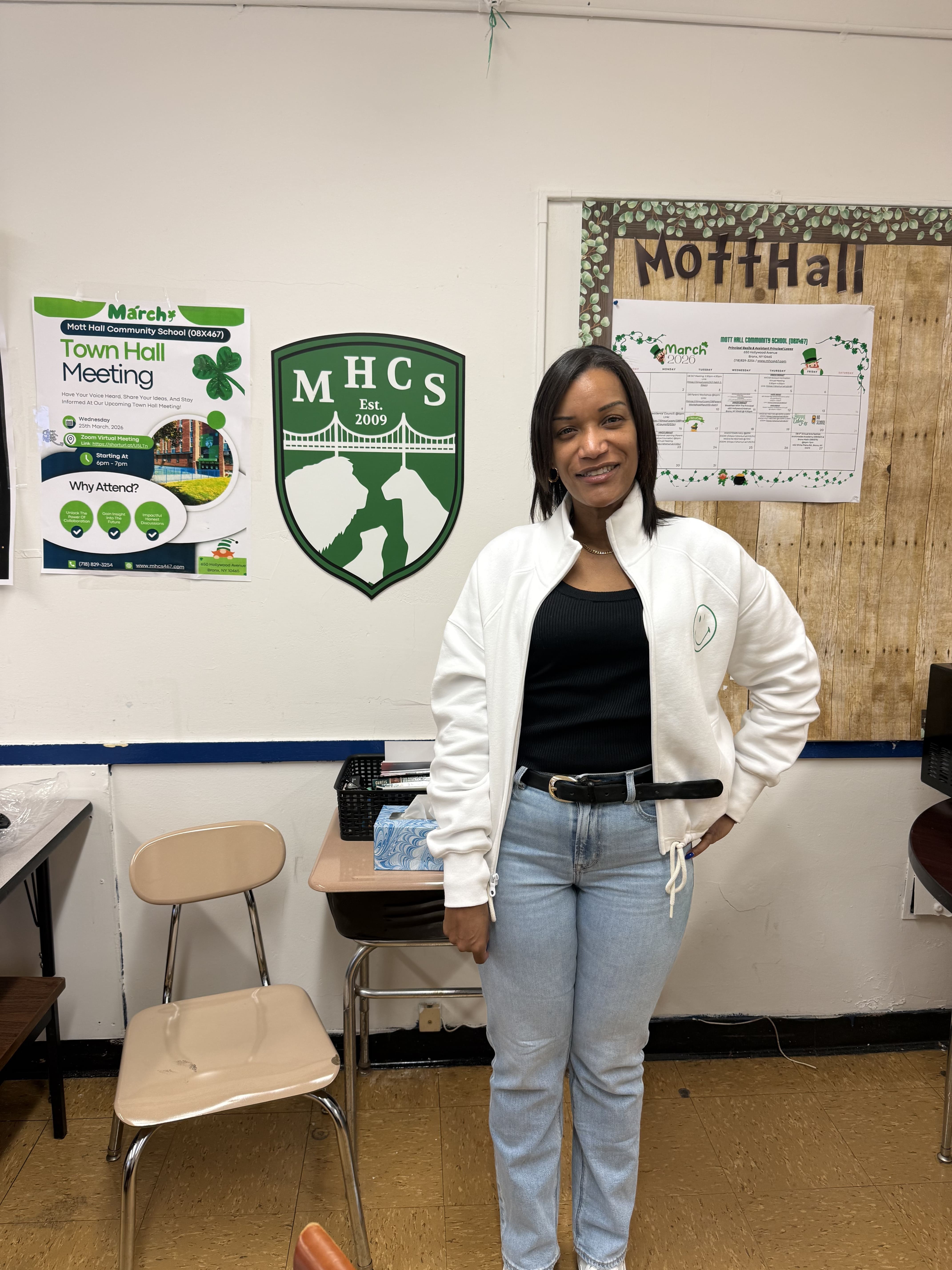 Yokasta Eralte smiling in a Mott Hall Community School classroom