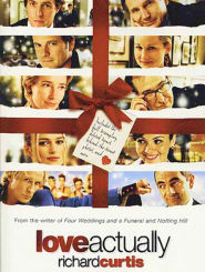 Here's alt text for this image:  "Movie poster for 'Love Actually' featuring a grid of ten headshots showing the main cast members: Hugh Grant, Liam Neeson, Colin Firth, Laura Linney, Emma Thompson, Alan Rickman, Keira Knightley, Martine McCutcheon, Bill Nighy, and Rowan Atkinson. A large red ribbon and bow runs vertically through the center of the poster with a handwritten gift tag. The title 'love actually' appears at the top in red and black letters, with the tagline 'THE ULTIMATE ROMANTIC COMEDY' at the bottom."