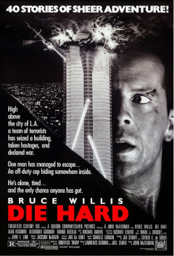 The movie poster for Die Hard, starring Bruce Willis. The left side shows a tall skyscraper, the Nakatomi Plaza, with its top floors engulfed in a massive explosion and orange fire. A helicopter is visible near the top of the building. The right side of the poster features a close-up, high-contrast image of Bruce Willis’s face looking intense and sweaty. Text on the left reads "40 STORIES OF SHEER ADVENTURE!" and the title "DIE HARD" is written in large red letters at the bottom.