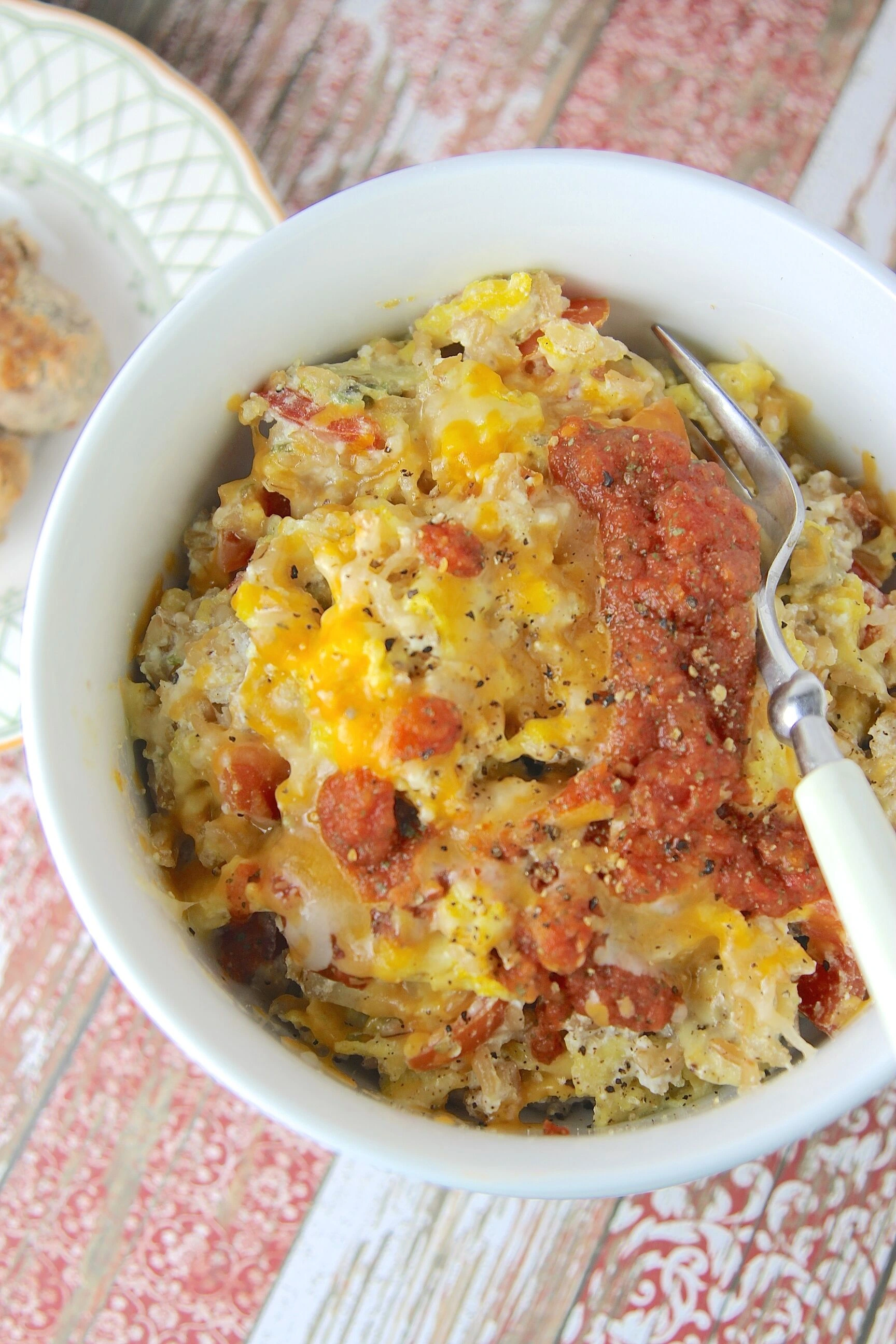 Cheesy Scrambled Egg & Brown Rice Breakfast Bowl dish