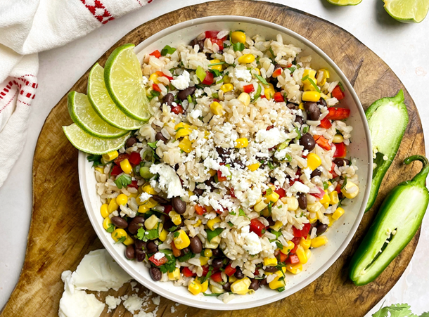 A bowl of rice and vegetablesAI-generated content may be incorrect.
