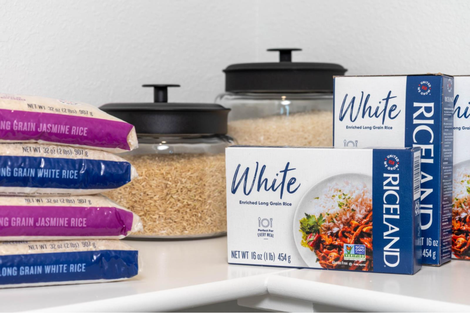 A group of packages of rice and a stack of containersAI-generated content may be incorrect.