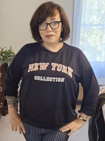 Barbara in a New York sweatshirt